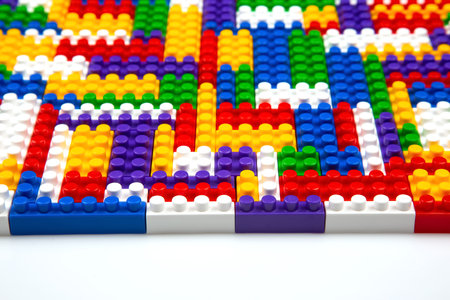 Abstract background texture of colored constructor blocks. Background of colorful plastic part of...