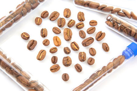 Coffee Industry Testing and Inspection â Roasted coffee beans under laboratory examination with scientific instruments, symbolizing quality control in coffee productionの写真素材