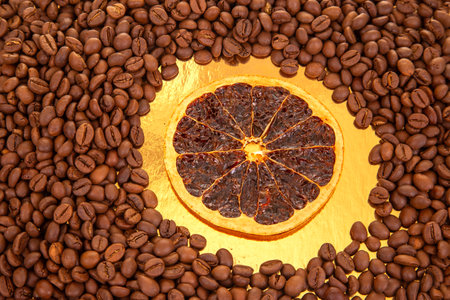 dried orange slices resting on roasted coffee beans, perfect for coffee lovers and culinary inspiration. coffee aroma and taste descriptorsの写真素材
