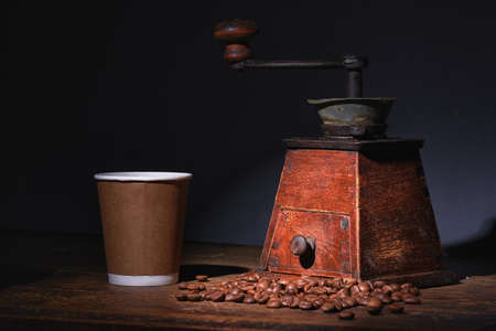 Coffee beans on a wooden background blackの写真素材