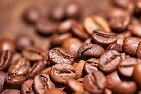 Coffee beans on a wooden background blackの写真素材