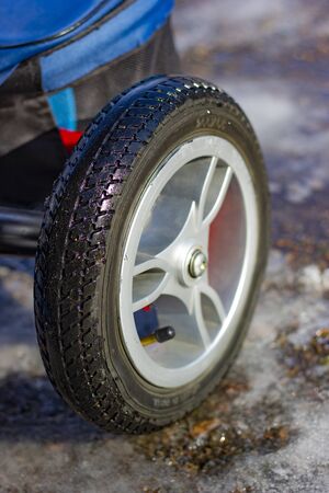 wheel on ice with summer tires on a bicycleの写真素材