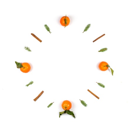 Christmas composition of mandarin, clock, top view, flat layの写真素材