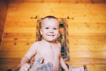 happy baby in the bedroomの写真素材