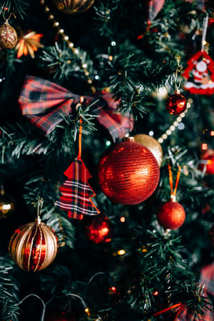 Christmas tree with toys and decorative snow for a happy new yearの写真素材