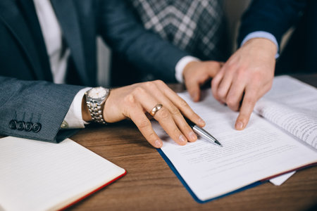 Business close-up of hands and documentsの写真素材