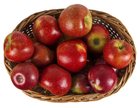 basket full of ripe juicy sweet red applesの写真素材