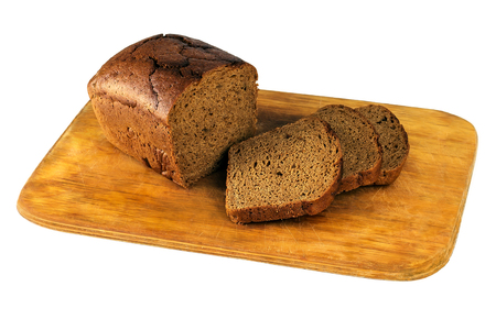 Brown bread on white background diced on whiteboardの写真素材
