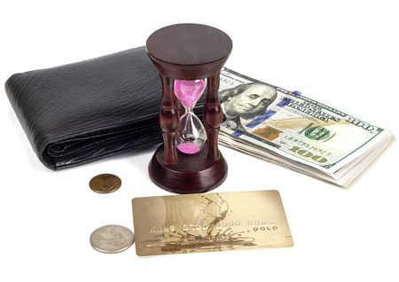 Dollars, cents, a plastic card, a purse, an hourglass