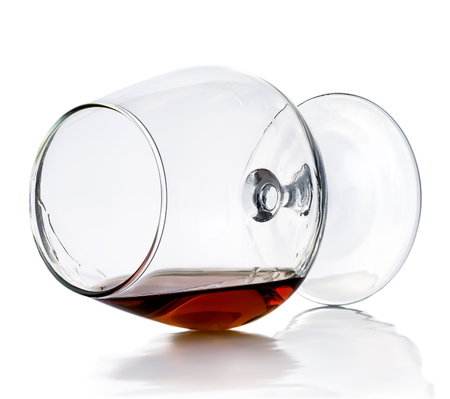 A glass of cognac isolated on white backgroundの写真素材