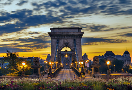 Chain Bridge in Hungary Budapest, illuminated by lanterns at dawn.の写真素材
