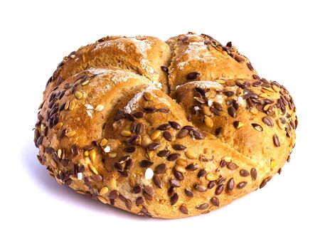 Tasty, airy, attractive, fragrant bun, sprinkled with seeds and icing sugarの写真素材