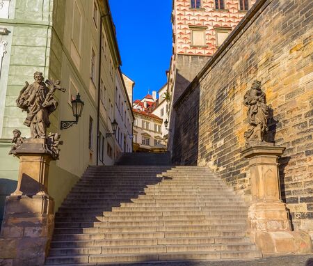 Prague, Czech Republic. Old street with stairs sunny day.の写真素材
