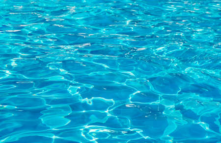 water in swimming pool rippled water detail backgroundの写真素材