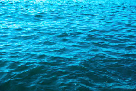 Blue sea water background textureの写真素材