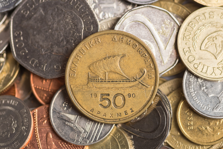 Background of  coins money. Fifty drachmas. Copy space for textの写真素材