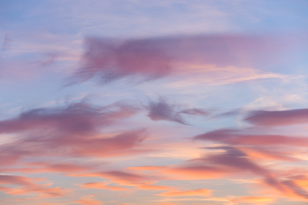 The vivid sky or heaven background of blue, red, crimson and purple clouds of evening sunset or morning daybreakの写真素材