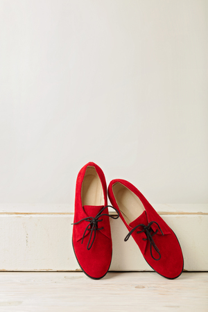 Women's shoes (oxfords) red color. Selective focus.の写真素材