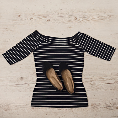 Female top in a strip of white and navy. Selective focus.の写真素材