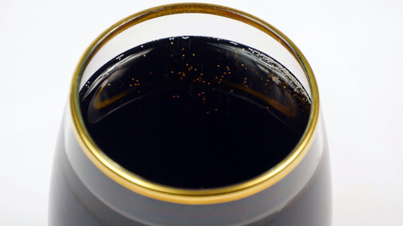 glass with soda water close up on white backgroundの写真素材