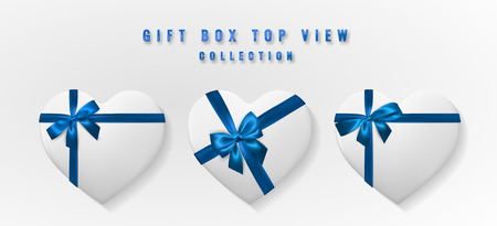 Set White heart shape gift box with bow and ribbon top view. Element for decoration gifts, greetings, holidays. Vector illustration.のイラスト素材