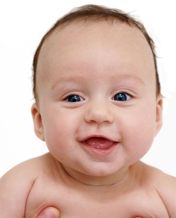 baby girl is delighted with something, looks in camera, on white backgroundの写真素材