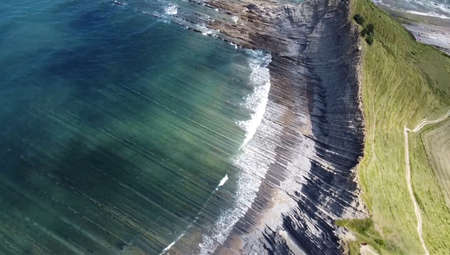 Beautiful view of the sea and mountains. A bird's-eye view of the rocky coast. Top viewの写真素材