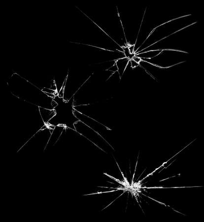 Overlay the effect of glass damage. Split glass on a black background. A crack in the glass.の写真素材