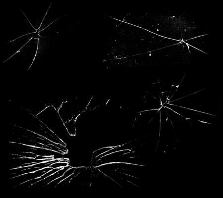 Overlay the effect of glass damage. Split glass on a black background. A crack in the glass.の写真素材