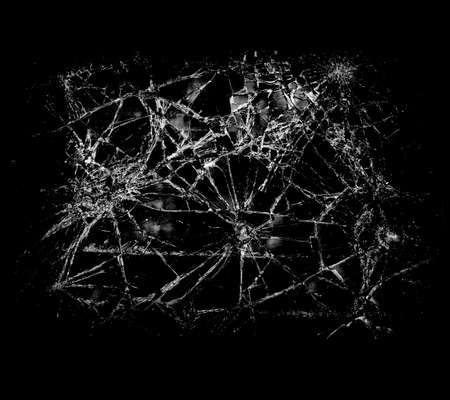 Overlay the effect of glass damage. Split glass on a black background. A crack in the glass.の写真素材