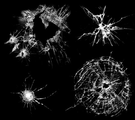 Overlay the effect of glass damage. Split glass on a black background. A crack in the glass.の写真素材