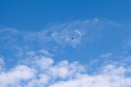 Flying paragliding on the beachの写真素材
