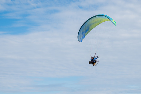 Flying paragliding on the beach