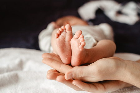 feet of a newborn childの写真素材