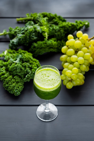 freshly squeezed kale and grape juiceの写真素材