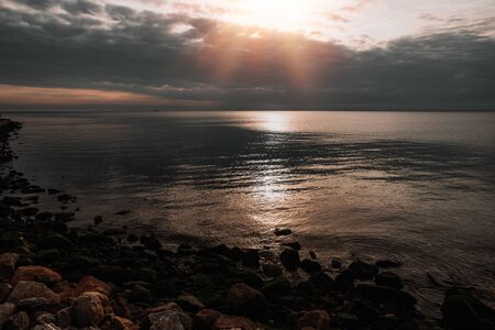 sunset on the beach in Helの写真素材