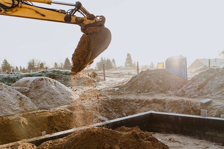 working excavator on a construction site