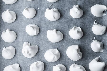 preparing meringues for baking in the oven