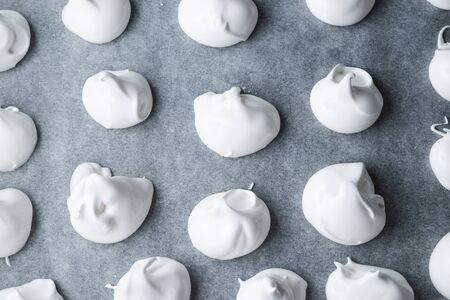 preparing meringues for baking in the ovenの写真素材