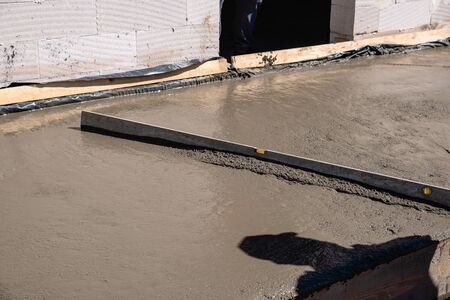 pouring cement onto the terraceの写真素材
