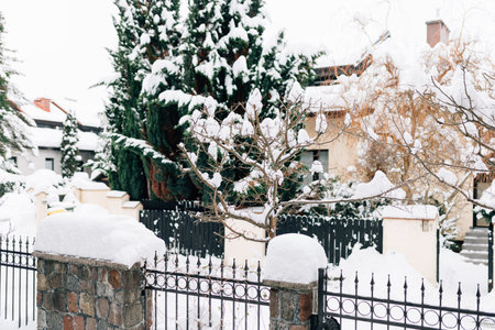 district with houses covered with snowの写真素材