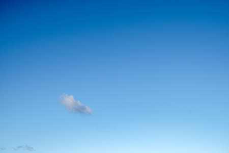 blue sky with little white cloudsの写真素材