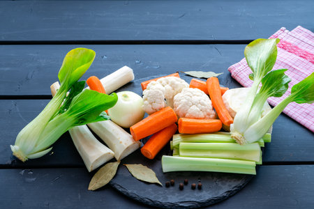 fresh soup vegetables prepared for cooking brothの写真素材
