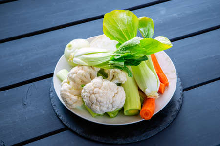 fresh soup vegetables prepared for cooking brothの写真素材