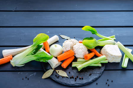 fresh soup vegetables prepared for cooking brothの写真素材