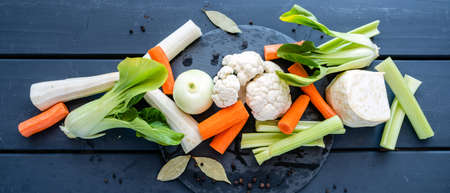 fresh soup vegetables prepared for cooking brothの写真素材