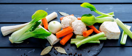 fresh soup vegetables prepared for cooking brothの写真素材
