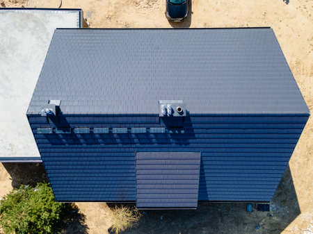 construction of a roof in a single-family house made of ceramic tilesの写真素材