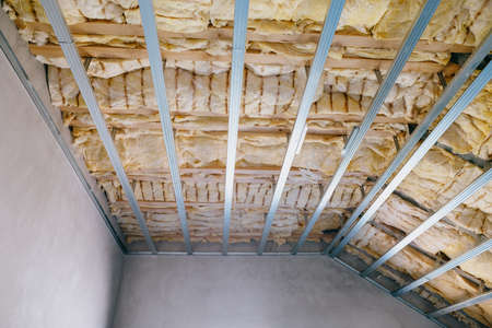 insulation of the attic with glass woolの写真素材