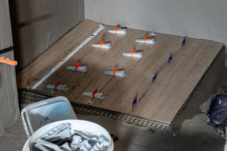 laying tiles in the bathroomの写真素材